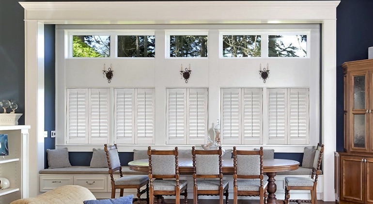 Hartford great room with white plantation shutters.